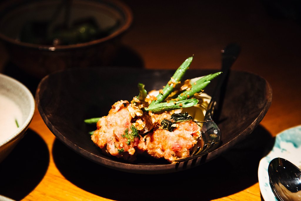 Kaffir lime and smoked fish relish with sweet pork, salted fish dumplings, coconut poached bamboo and vegetables